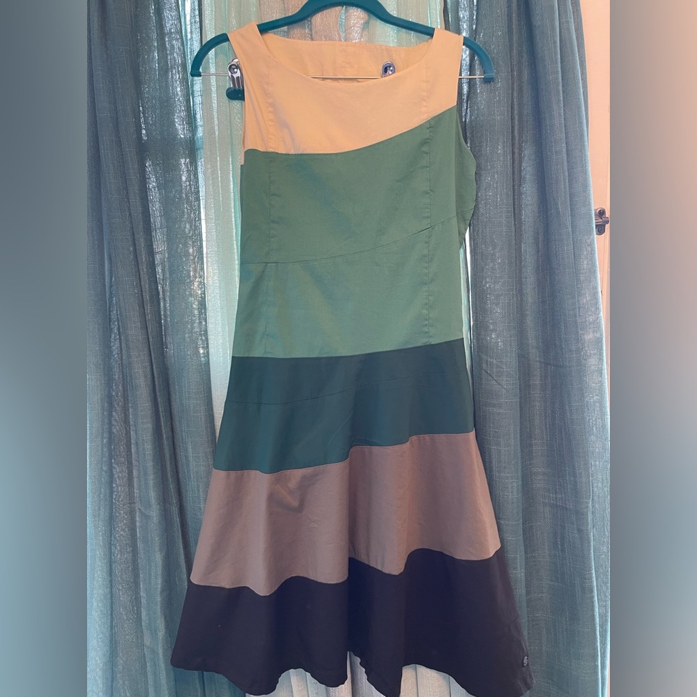 Color block cocktail dress in green shades.